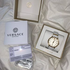 White Versace watch with gold rim and details